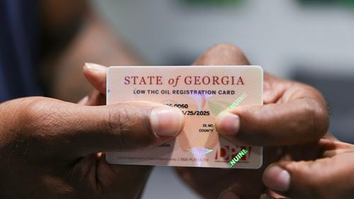 Customers of medical marijuana products in Georgia must have a special card issued by the state of Georgia. In its first year of availability, people have turned to the products for health needs, but low-income residents can’t always afford it.  (Natrice Miller/natrice.miller@ajc.com)