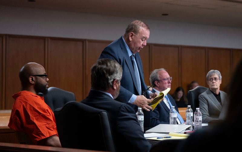 Jonathan Carr's lawyers speak during a hearing on Monday, April 22, 2024 in Judge Jeff Goering's courtroom. The judge denied a request for a resentencing hearing for two brothers awaiting the death penalty for a quadruple killing known as the “Wichita massacre,” ruling that he lacks jurisdiction to approve a reexamination of the sentences. Reginald Carr did not attend the hearing. (Jaime Green/The Wichita Eagle via AP)