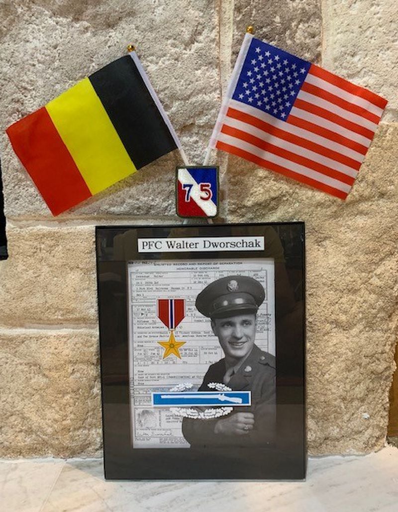 Madison Dworschak arranged items from her grandfather Walter Dworschak’s military service to create a plaque in his honor. The plaque includes his honorable discharge certificate, his Bronze Star, Combat Infantryman Badge and a patch representing his 75th Infantry Division from WWII.