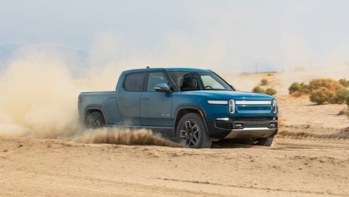 Rivian is expected to deliver its new electric truck to consumers starting in March. The company has one manufacturing site in Illinois but also is expected to build a factory in Georgia to manufacture trucks and SUVs.