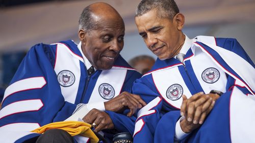 President Barack Obama sits with Vernon Jordan during a commencement ceremony at Howard University in 2016. Jordan, the civil rights activist and Washington power broker whose private counsel was sought both by the powerful at the top levels of government and those in the corporate world, died March 1. He was 85. (Zach Gibson/The New York Times)