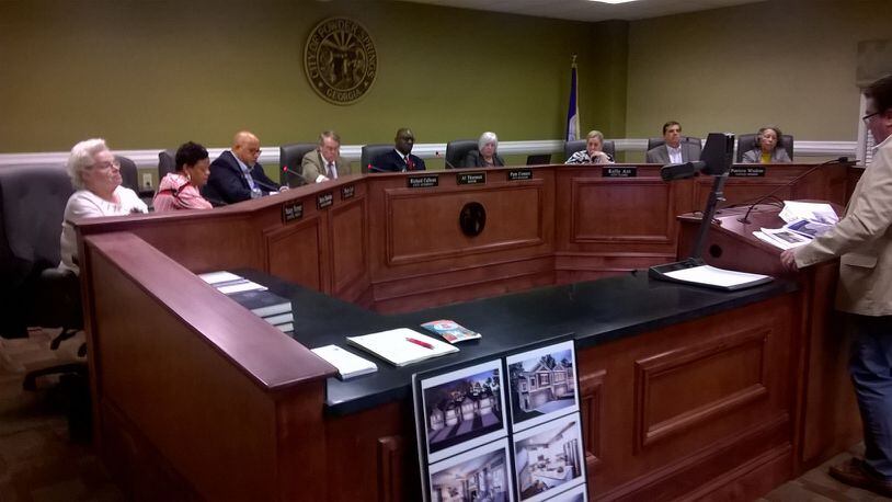 The Powder Springs City Council has decided to withdraw two ordinances that would have increased the annual pay of the mayor and Council members beginning Jan. 1 - pay that has stayed the same since 2005. AJC file photo
