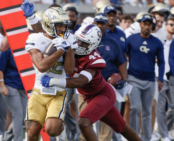 Georgia Tech Yellow Jackets wide receiver Dominick Blaylock extends a pass reception over South Carolina State Bulldogs linebacker DJ Bethea (44)  for a first down in the second half.   (Bob Andres for the Atlanta Journal Constitution)