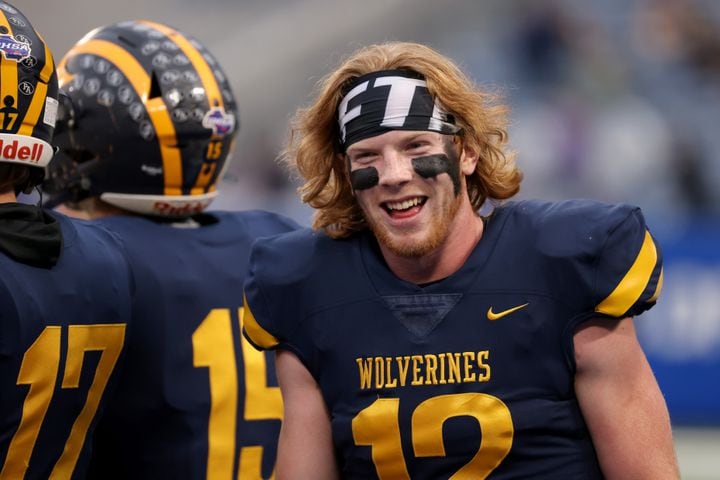Prince Avenue Christian quarterback Brock Vandagriff (12) reacts with teammates after a touchdown in the first half against Trinity Christian during the Class 1A Private championship at Center Parc Stadium Monday, December 28, 2020 in Atlanta, Ga.. JASON GETZ FOR THE ATLANTA JOURNAL-CONSTITUTION