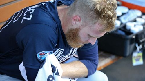 Braves starting pitcher Mike Foltynewicz reacts in the dugout after giving up a home run to the Los Angeles Dodgers in the first inning. The Braves lost 6-0. Curtis Compton/ccompton@ajc.com