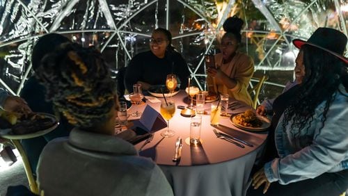 Celebrate the new year with a dinner in one of 9 Mile Station's holiday igloos.