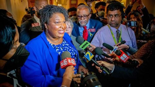  Stacey Abrams talks with the press at the State Capitol after qualifying to run for office on the second day of qualifying Tuesday, March 8, 2022, at the Georgia State Capitol.  STEVE SCHAEFER FOR THE ATLANTA JOURNAL-CONSTITUTION