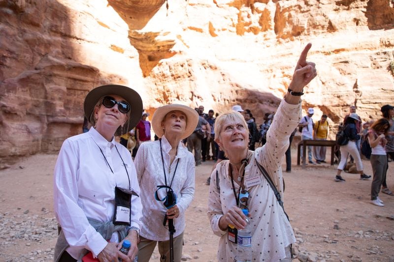 Road Scholar travel company's Jet Trip, in Petra, Jordan. Left to right: Participant Shelby Key, Pamela Kross and Group Leader Chris Brangwin looking at The Khasneh.