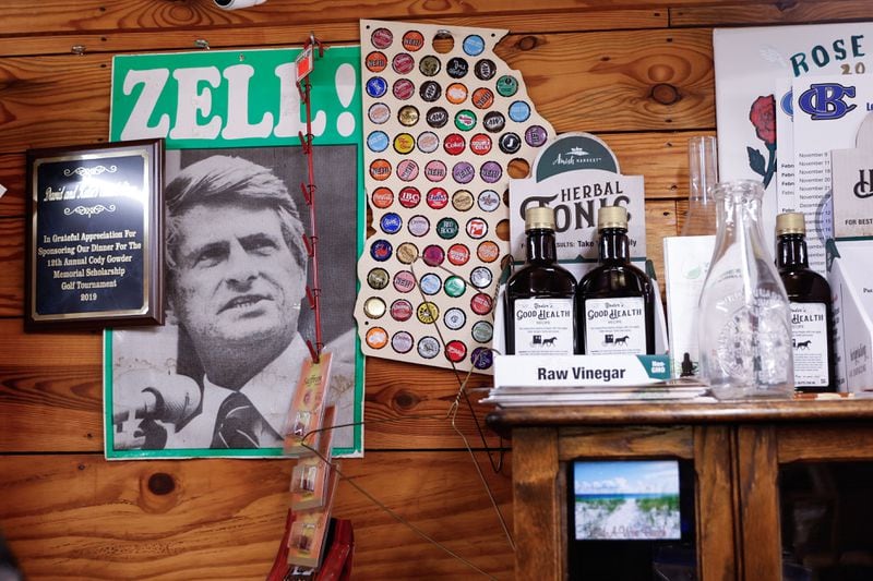 A poster of Zell Miller is mounted on the wall of David and Katie’s Amish Store in Homer, Ga., on Friday, April 5, 2024. Miller was a two-term Georgia governor and a lifelong Democrat who later was critical of the party and gave the keynote speech at the 2004 Republican National Convention.(Natrice Miller/ AJC)