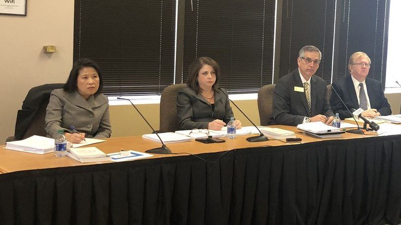 The State Election Board approved a plan Monday to allow Georgia voters to request absentee ballots by going online. From left: State Election Board members Anh Le, Rebecca Sullivan, Secretary of State Brad Raffensperger and David Worley. MARK NIESSE / MARK.NIESSE@AJC.COM