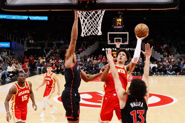 Atlanta Hawks forward Jalen Johnson (1) attempts a shot against the Toronto Raptors during the first half at State Farm Arena on Sunday, January 28, 2024, in Atlanta.

 Miguel Martinez / miguel.martinezjimenez@ajc.com