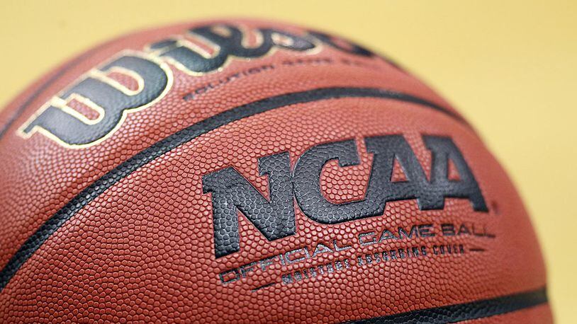 LOUISVILLE, KY - MARCH 15:  A detail of an official NCAA Men's Basketball game ball made by Wilson is seen on the court as the Iowa State Cyclones play against the Connecticut Huskies during the second round of the 2012 NCAA Men's Basketball Tournament at KFC YUM! Center on March 15, 2012 in Louisville, Kentucky.  (Photo by Andy Lyons/Getty Images)