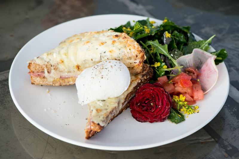  Croque Madame, grilled ham and cheese, with dijon and gruyere, topped with a poached egg. Photo credit- Mia Yakel.