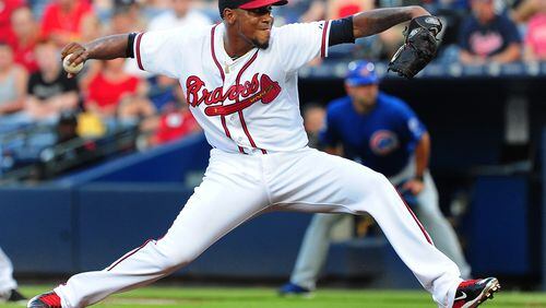 Julio Teheran #49 of the Atlanta Braves throws a first inning pitch against the Chicago Cubs at Turner Field on July 17, 2015 in Atlanta, Georgia. (Photo by Scott Cunningham/Getty Images)