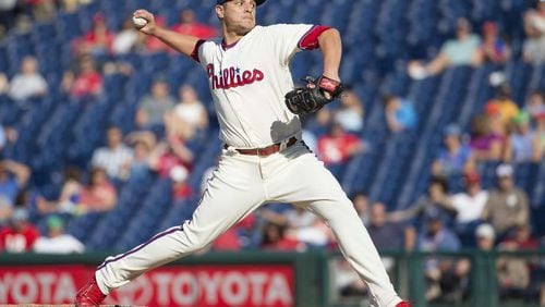 David Hernandez posted a 3.84 ERA in 70 appearances for the Phillies in 2016 and had 80 strikeouts in 72 2/3 innings. Here he delivers a pitch against the Braves in a Sept. 4 game. Hernandez signed a minor league deal with the Braves on Sunday. (AP photo)