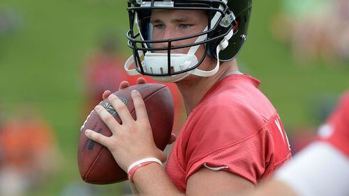 Falcons rookie QB Jeff Mathews looks to throw during the minicamp. Atlanta Falcons players workout during the second day of mini-camp at the team's facilities in Flowery Branch, Wednesday, June 18, 2014. (KENT D. JOHNSON/KDJOHNSON@AJC.COM)