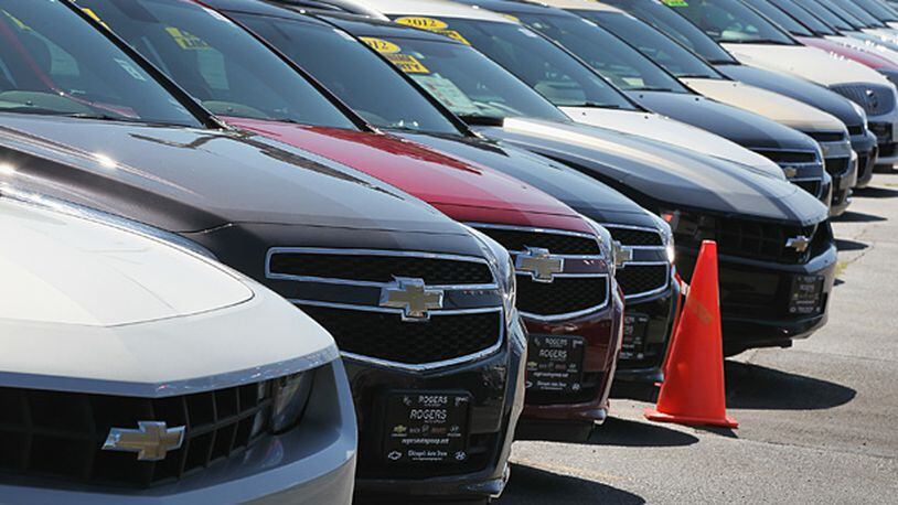CHICAGO, IL - JULY 23: Chevrolet and Buick cars are offered for sale at a dealership on July 23, 2014 in Chicago, Illinois. GM today announced the recall of another nearly 720,000 Chevrolet, Cadillac, Buick and GMC vehicles for various defects. (Photo by Scott Olson/Getty Images)