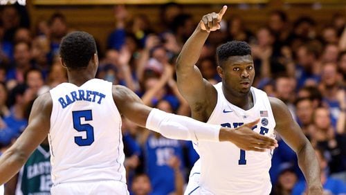 RJ Barrett and Zion Williamson of the Duke Blue Devils react during the second half of their game against the Eastern Michigan Eagles at Cameron Indoor Stadium on November 14, 2018 in Durham, North Carolina. (Photo by Grant Halverson/Getty Images)