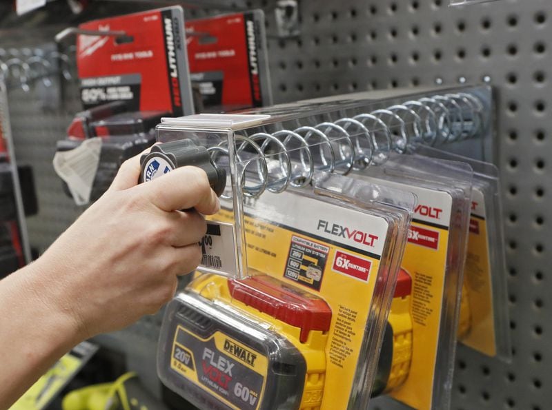 Spiral Anti-Sweep Hooks make it time consuming to remove a single product, ensuring thieves will be captured on cameras, and make it impossible to “sweep” multiple products off the hook. Bob Andres / robert.andres@ajc.com