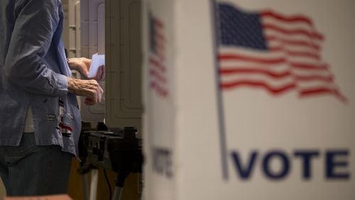 An election transparency group has called for Georgia to abandon electronic voting in next week’s election. (CASEY SYKES / CASEY.SYKES@AJC.COM)