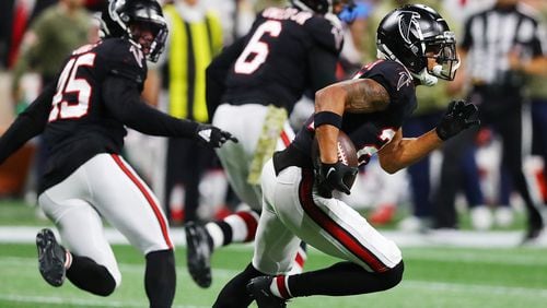 111821 Atlanta: Falcons cornerback A.J. Terrell intercepts Patriots quarterback Mac Jones during the third quarter in a NFL football game on Thursday, Nov. 18, 2021, in Atlanta.    “Curtis Compton / Curtis.Compton@ajc.com”