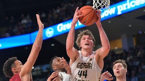 With center Ben Lammers defending the rim and clearing rebounds, Georgia Tech went into its Saturday matchup at Syracuse ranked No. 5 nationally in adjusted defensive efficiency by KenPom. (AJC photo by Hyosub Shin)