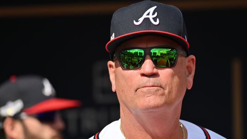 Atlanta Braves manager Brian Snitker surveys the field before game one of the baseball playoff series between the Braves and the Phillies at Truist Park in Atlanta on Tuesday, October 11, 2022. (Hyosub Shin / Hyosub.Shin@ajc.com)