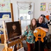 Anna Jensen and husband Kevn Kinney, founder of rock band Drivin N Cryin, pose for a portrait at their home in Scottdale. Jensen contributed artwork for album covers and digital singles as part of a year-long tribute to Kinney. (Arvin Temkar / arvin.temkar@ajc.com)