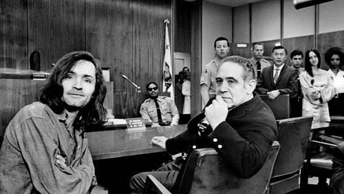 Charles Manson, left, during a recess in a Superior Court hearing into Gary Hinman's slaying in 1970. Beside him is his attorney, Irving A. Kanarek. Kanarek died Sept. 2 at age 100.