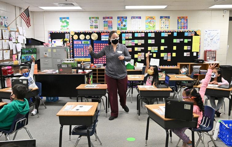 Gwinnett custodian goes from cleaning bathrooms to teaching classrooms
