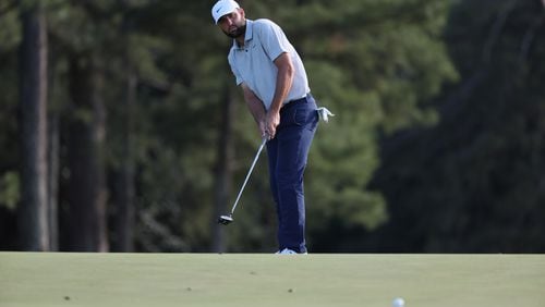 Scottie Scheffler hits on 18th hole at the 2024 Masters Tournament at Augusta National Golf Club, Thursday, April 11, 2024, in Augusta, Ga. Jason Getz / Jason.Getz@ajc.com)
