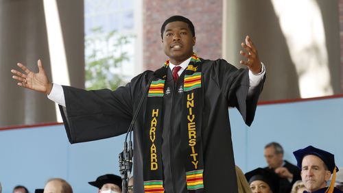 Noah Harris, the first Black man elected student body president, addresses fellow graduates during Harvard's 371st Commencement, Thursday, May 26, 2022, in Cambridge, Mass. (AP Photo/Mary Schwalm)