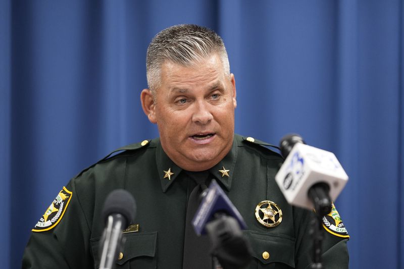 Okaloosa County Sheriff Eric Aden holds a news conference where he shared deputy body cam footage of the May 3, 2024 shooting of Roger Fortson, a U.S. Navy airman, Thursday, May 9, 2024, in Fort Walton Beach, Fla. Fortson was shot in his apartment after a response to a complaint. (AP Photo/Gerald Herbert)