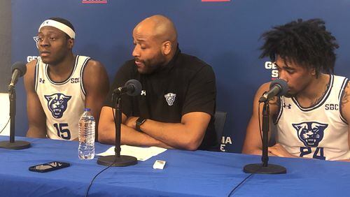 Georgia State's (L-R) Ja'Heim Hudson, coach Jonas Hayes and Collin Moore after the 88-77 loss to Marshall on Feb. 11, 2023, at the GSU Convocation Center. (Photo by Stan Awtrey for the AJC)