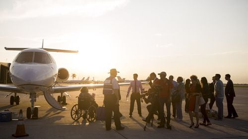 People arrive in West Palm Beach, Florida, from Puerto Rico on Tuesday, Sep. 26, 2017. The Eagles Wings Foundation led a rescue mission that transported elderly nursing home patients and some family members to safety after Hurricane Maria ravaged Puerto Rico. (Calla Kessler / The Palm Beach Post)