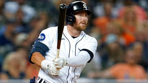 Detroit Tigers' Robbie Grossman bats against the Texas Rangers in the seventh inning of a baseball game in Detroit, Friday, June 17, 2022. (AP Photo/Paul Sancya)