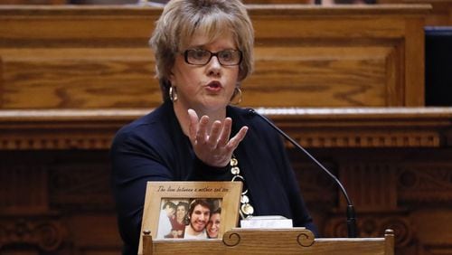Sen. Renee Unterman, R-Buford, has sponsored several bills to address the opioid crisis in Georgia. On the lectern in front of her is a photo of an unidentified opiod victim. BOB ANDRES /BANDRES@AJC.COM
