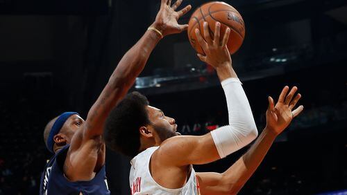 DeAndre Bembry of the Atlanta Hawks drives to the basket in a game against the New Orleans Pelicans at Philips Arena on November 22, 2016 in Atlanta, Georgia. (Photo by Kevin C. Cox/Getty Images)