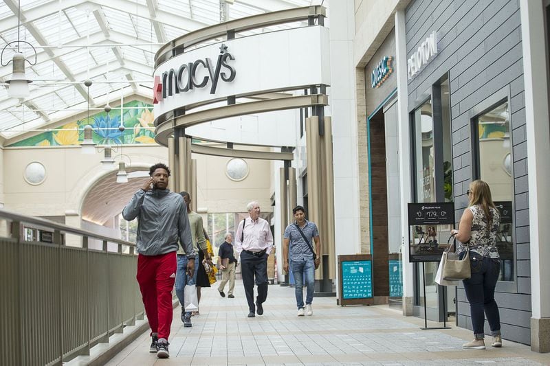Macy’s occupies the same space as original anchor Rich’s at Lenox Square. The exterior and much of the interior of the mall have been transformed and expanded over the years, but the original building blocks remain. (Alyssa Pointer/alyssa.pointer@ajc.com)