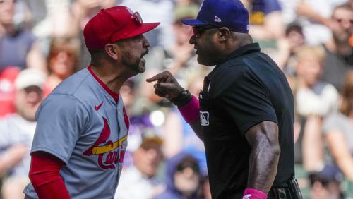 St. Louis Cardinals manager Oliver Marmol argues with home plate umpire Alan Porter during the third inning of a baseball game against the Milwaukee Brewers Sunday, May 12, 2024, in Milwaukee. Marmol was ejected from the game. (AP Photo/Morry Gash)