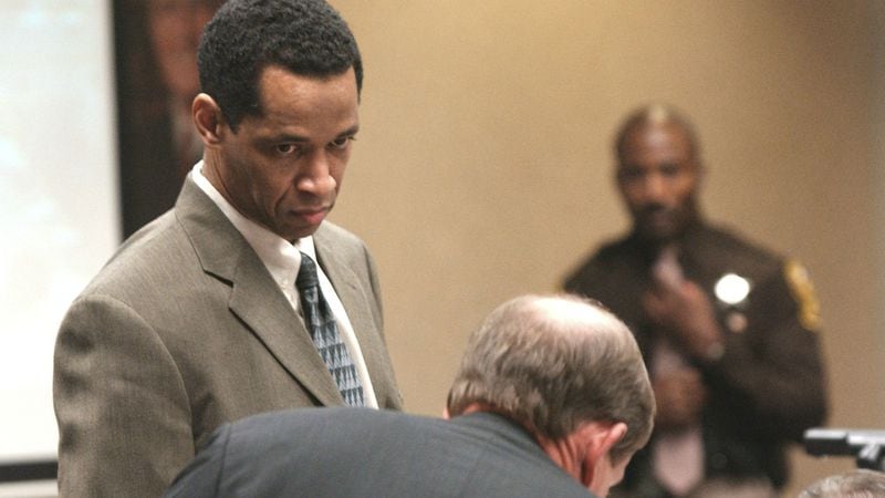John Allen Muhammad eyes a prosecutor Oct. 21, 2003, during Muhammad's capital murder trial in Virginia Beach Circuit Court. Muhammad, 41, and Lee Boyd Malvo, then only 17, were known as the Beltway snipers, a pair of killers who targeted more than a dozen victims over a three-week span in the fall of 2002, killing 10 people. Muhammad, who represented himself at trial, was executed by lethal injection in November 2009 at age 48. Malvo, now 33, has been granted a new sentencing hearing in four Virginia slayings for which he was sentenced to life without parole.