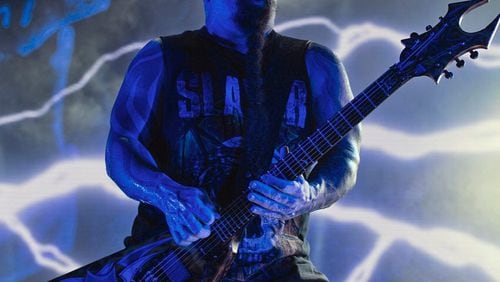 A man was at “Mayhem Festival” at Lakewood Amphitheater when an unknown person ran up and hit him with a skateboard, a lawsuit alleges. Slayer, pictured here, was one of the bands to play in Atlanta.