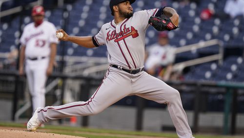 Atlanta Braves starting pitcher Huascar Ynoa throws during the first inning of baseball game against the Washington Nationals at Nationals Park, Tuesday, May 4, 2021, in Washington. (AP Photo/Alex Brandon)