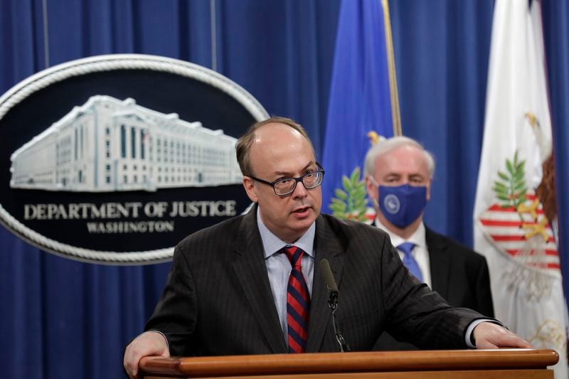 Acting Assistant U.S. Attorney General Jeffrey Clark speaks next to Deputy U.S. Attorney General Jeffrey Rosen at a news conference at the Justice Department in Washington, D.C., on Oct. 21, 2020. (Yuri Gripas/POOL/AFP/Getty Images/TNS)