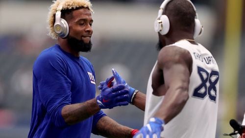 ARLINGTON, TX - SEPTEMBER 11: Odell Beckham #13 of the New York Giants greets Dez Bryant #88 of the Dallas Cowboys during pregame warm up at AT&amp;T Stadium on September 11, 2016 in Arlington, Texas. (Photo by Tom Pennington/Getty Images) ORG XMIT: 659019441 ORIG FILE ID: 602421292