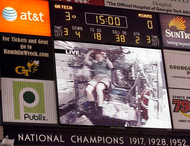 A Georgia Tech graduate from the Space Shuttle is shown on the jumbotron in the second quarter of their game hosting Miami Thursday night in Atlanta, Ga., November 20, 2008.  JASON GETZ / jgetz@ajc.com