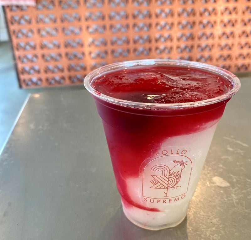 Pollo Supremo’s sweet-tangy frozen margarita is drizzled with vivid red hibiscus syrup and sells for $8. Wendell Brock for The Atlanta Journal-Constitution