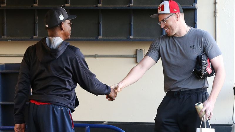 February 16, 2017, Lake Buena Vista, FL: Braves first baseman Freddie Freeman introduces himself to third base coach Ron Washington as he arrives for spring training at Champion Stadium on Thursday Feb. 16, 2017, at the ESPN Wide World of Sports in Lake Buena Vista.   Curtis Compton/ccompton@ajc.com