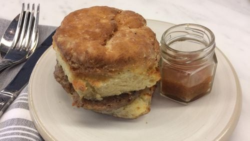 Mourning Dove Cafe’s chicken sausage biscuit with apple butter is one thing the Buckhead coffee bar does very well. CONTRIBUTED BY WENDELL BROCK