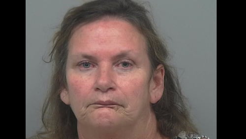 Sandra Christine Olver has been charged with murder and aggravated assault.